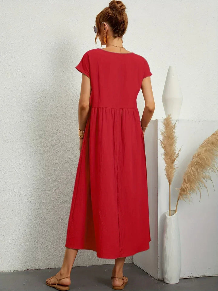 Livia | Abito Maxi Svasato con Tasche