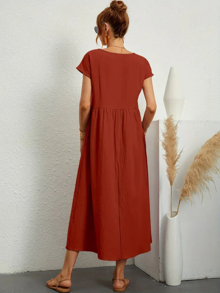 Livia | Abito Maxi Svasato con Tasche