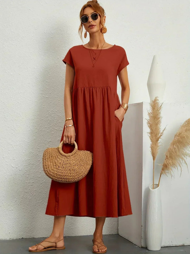 Livia | Abito Maxi Svasato con Tasche