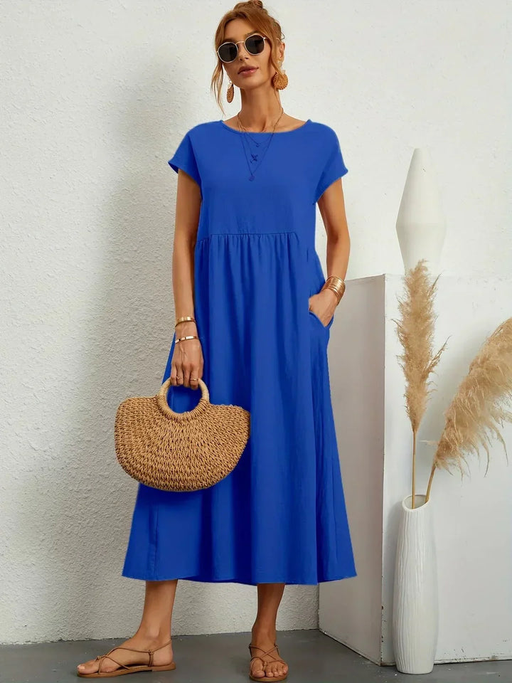 Livia | Abito Maxi Svasato con Tasche