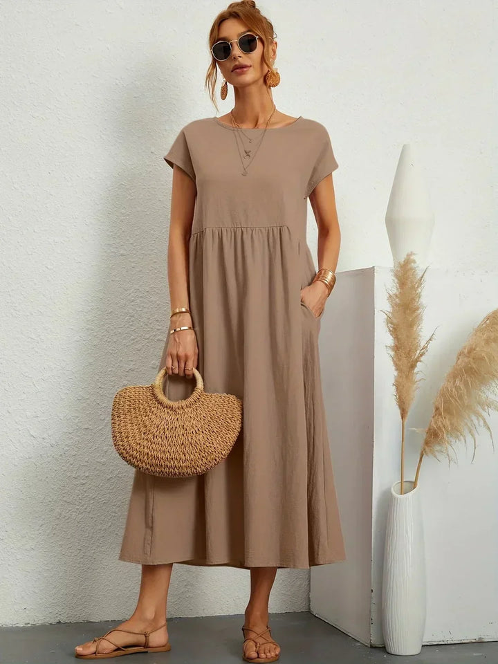 Livia | Abito Maxi Svasato con Tasche