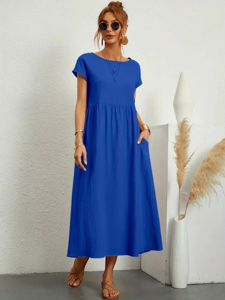 Livia | Abito Maxi Svasato con Tasche