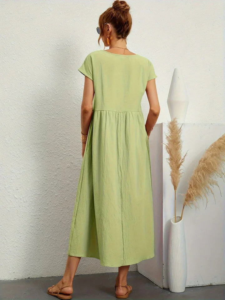 Livia | Abito Maxi Svasato con Tasche