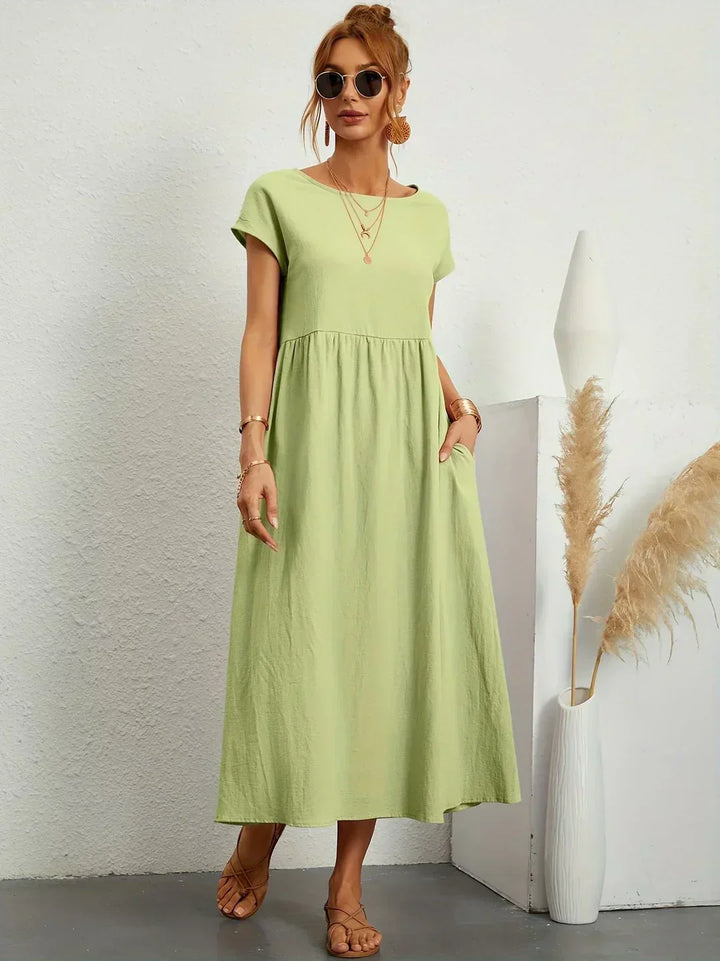 Livia | Abito Maxi Svasato con Tasche