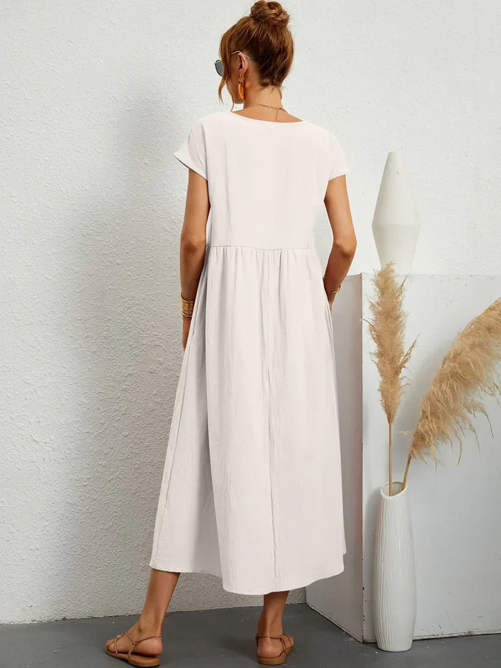 Livia | Abito Maxi Svasato con Tasche