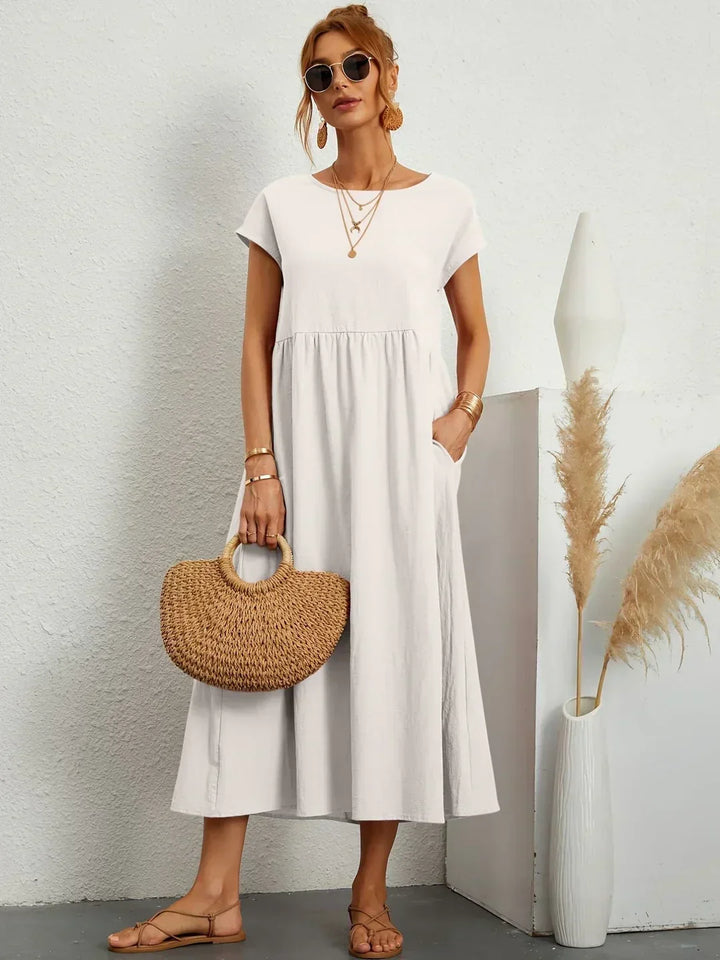 Livia | Abito Maxi Svasato con Tasche