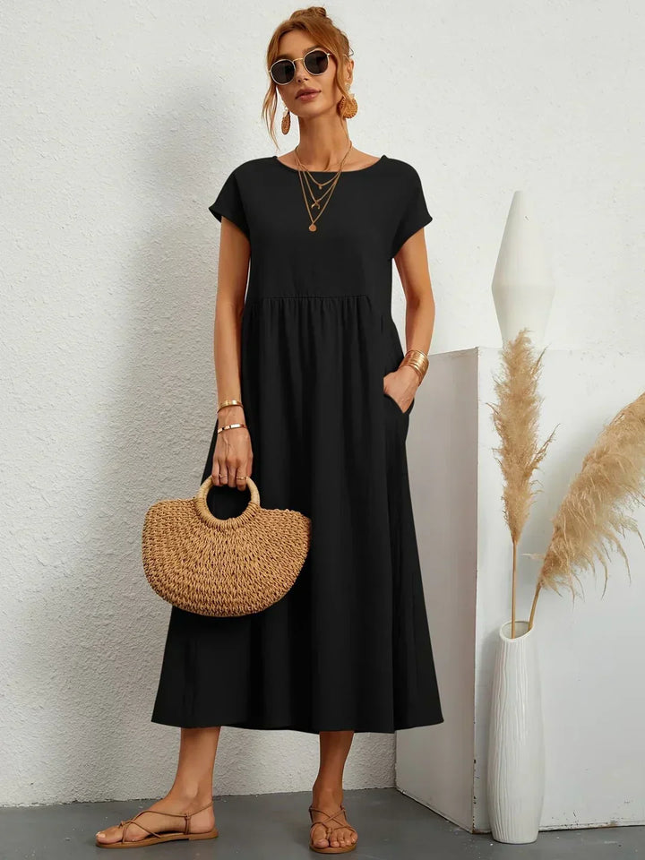 Livia | Abito Maxi Svasato con Tasche
